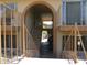 This apartment's stairwell features brick archways, iron railings and a view to the outdoors in this well maintained community at 1130 E Butler Dr # B4, Phoenix, AZ 85020