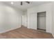 Spacious bedroom with wood flooring, closet, and natural light, offering a calming retreat at 1131 E Bishop Dr, Tempe, AZ 85282