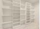 Walk-in closet with built-in shelving, offering generous storage space for an organized wardrobe at 1131 E Bishop Dr, Tempe, AZ 85282