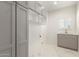 Functional laundry room with ample storage cabinets and a sink, combining utility and style at 1131 E Bishop Dr, Tempe, AZ 85282