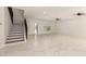 Bright living area with stairs and a ceiling fan, offering a view of the exterior at 1131 E Bishop Dr, Tempe, AZ 85282