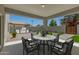 Charming covered patio with outdoor kitchen, perfect for entertaining guests or relaxing outdoors at 1131 E Bishop Dr, Tempe, AZ 85282
