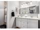Bathroom with a double sink vanity, and a tiled walk in shower at 1324 S Banning St, Gilbert, AZ 85296