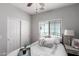 Charming bedroom with a stylish bed, soft pillows, and natural light from the window at 1324 S Banning St, Gilbert, AZ 85296