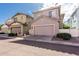Inviting home with a two-car garage, well-maintained front yard, and appealing curb appeal at 1324 S Banning St, Gilbert, AZ 85296