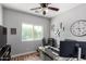 Functional home office with sleek desk, modern monitors, and comfortable executive chair at 1324 S Banning St, Gilbert, AZ 85296
