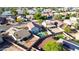 Inviting home features a sparkling pool, manicured lawn, and an outdoor entertaining area, perfect for enjoying the Arizona sunshine at 13625 W Peck Ct, Litchfield Park, AZ 85340