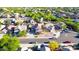 Residential area showcasing attractive homes, leafy trees, and a peaceful ambiance, ideal for comfortable living and raising a Gathering at 13625 W Peck Ct, Litchfield Park, AZ 85340