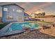 A sparkling pool with lounge chairs, perfect for enjoying sunny days in the backyard at 13625 W Peck Ct, Litchfield Park, AZ 85340