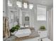 Bathroom featuring granite counters, vessel sink, and modern lighting at 13625 W Peck Ct, Litchfield Park, AZ 85340