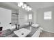 Contemporary bathroom featuring double sinks, granite counters, and modern fixtures at 13625 W Peck Ct, Litchfield Park, AZ 85340