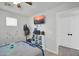 Casual bedroom with bright natural light, ceiling fan, and a cheerful, playful decor at 13625 W Peck Ct, Litchfield Park, AZ 85340