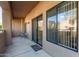 Cozy back patio offers seamless indoor-outdoor living with sliding glass door at 13805 N Hamilton Dr # H102, Fountain Hills, AZ 85268