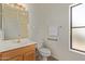 Well-lit bathroom features wood vanity, and matching towel bar and light fixture at 13805 N Hamilton Dr # H102, Fountain Hills, AZ 85268