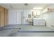 Laundry area with cabinetry, sink, washer, and dryer at 14110 W White Rock Dr, Sun City West, AZ 85375