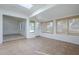 Inviting sun room with skylight, neutral tile, and lots of natural light at 14110 W White Rock Dr, Sun City West, AZ 85375