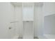 Spacious walk-in closet with custom shelving and ample storage at 14110 W White Rock Dr, Sun City West, AZ 85375