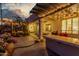 Inviting outdoor space featuring a covered patio area with string lights and a built-in bar at 1421 W Saltsage Dr, Phoenix, AZ 85045