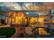 Spacious backyard showcasing a covered patio, lush lawn, and inviting pool area, perfect for outdoor living at 1421 W Saltsage Dr, Phoenix, AZ 85045