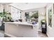Wet bar has white cabinets, lots of counter space and a bright view of the backyard at 1421 W Saltsage Dr, Phoenix, AZ 85045