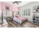 Charming bedroom with a vanity, cozy bed, and ample natural light from shuttered windows at 1421 W Saltsage Dr, Phoenix, AZ 85045