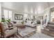 Spacious living room featuring elegant furnishings and plenty of natural light, perfect for relaxation and entertainment at 1421 W Saltsage Dr, Phoenix, AZ 85045