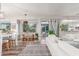 Spacious living room with seamless transition to the kitchen and views of the outdoor area at 1421 W Saltsage Dr, Phoenix, AZ 85045