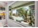 Scenic view of the backyard oasis, featuring a sparkling pool and lush landscaping at 1421 W Saltsage Dr, Phoenix, AZ 85045