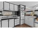 Well-organized kitchen featuring white cabinets and modern appliances at 1707 S 72Nd St, Mesa, AZ 85209