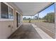 Covered patio area with view of well-maintained lawn at 1707 S 72Nd St, Mesa, AZ 85209