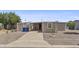 Inviting home with a tidy front yard, featuring a private driveway at 1707 S 72Nd St, Mesa, AZ 85209
