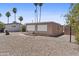 Back exterior of home with minimal landscaping at 1707 S 72Nd St, Mesa, AZ 85209