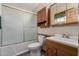 Clean bathroom featuring a tiled floor, tub with shower, vanity, and toilet at 2003 W Tyson St, Chandler, AZ 85224