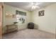 Cozy bedroom featuring a ceiling fan, carpet, and lots of natural light at 2003 W Tyson St, Chandler, AZ 85224