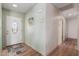 Welcoming foyer with light green walls, wood flooring, and decorative accents at 2003 W Tyson St, Chandler, AZ 85224
