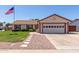Charming single-Gathering home featuring a well-manicured lawn and an attached two-car garage at 2003 W Tyson St, Chandler, AZ 85224