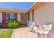 Charming porch features comfortable seating, perfect for enjoying quiet moments outdoors at 2003 W Tyson St, Chandler, AZ 85224
