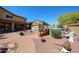 Backyard features above ground pool, storage shed, desert landscaping and desert landscaping at 22022 W Moonlight Path, Buckeye, AZ 85326