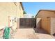 Walled backyard features a paved area at 22022 W Moonlight Path, Buckeye, AZ 85326