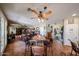 Open-concept living area with decorative features and spacious layout, seamlessly connects living spaces at 22022 W Moonlight Path, Buckeye, AZ 85326