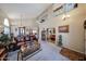 Large living room with a high ceiling, fireplace, loft and comfortable seating at 22022 W Moonlight Path, Buckeye, AZ 85326