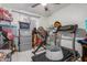 Versatile basement space with exercise equipment and ample storage solutions at 2207 N 53Rd Ave, Phoenix, AZ 85035