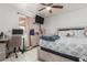 Relaxing bedroom featuring a bed, desk, and neutral toned walls at 2207 N 53Rd Ave, Phoenix, AZ 85035