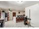 Bright kitchen featuring stainless steel appliances, ceiling fans, and a large center island with barstools at 2207 N 53Rd Ave, Phoenix, AZ 85035