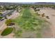 Beautiful aerial of a sprawling golf course with lush green fairways and desert landscaping at 2592 E San Rafael Trl, Casa Grande, AZ 85194