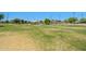 Expansive community park with open grassy areas and shaded structures for outdoor enjoyment at 2592 E San Rafael Trl, Casa Grande, AZ 85194