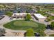 Aerial shot of the golf course, with the club house, in a beautiful Primary-planned community at 2592 E San Rafael Trl, Casa Grande, AZ 85194
