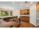 Kitchen with stainless steel appliances, wood cabinets, granite counters and tile floors at 2592 E San Rafael Trl, Casa Grande, AZ 85194