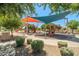 View of playground, shaded by colorful sunshades in a common area of the community at 2592 E San Rafael Trl, Casa Grande, AZ 85194