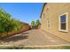 The side yard has low maintenance desert landscaping at 2592 E San Rafael Trl, Casa Grande, AZ 85194